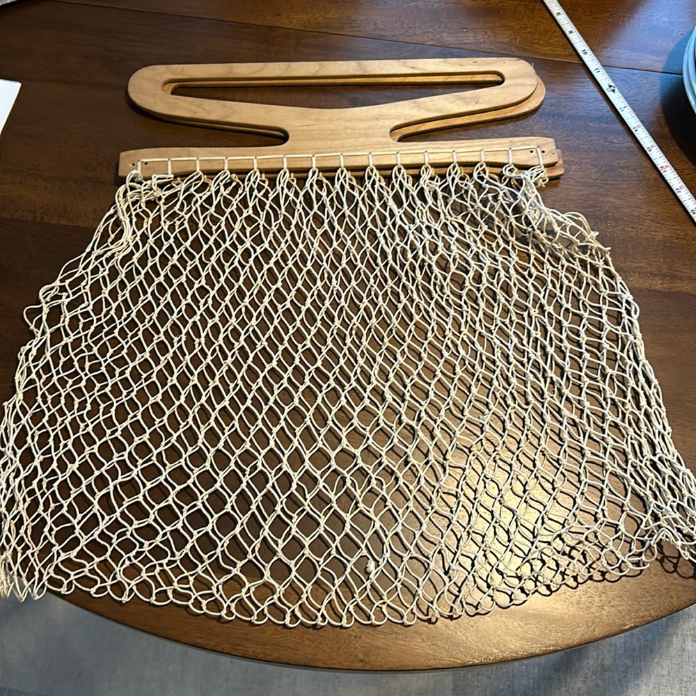 Vintage knotted net fishnet market bag, tote bag, shopping bag with wood handle.